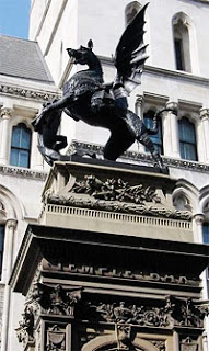 Photo: A statue of a heraldic dragon tops the present-day Temple Bar marker in front of the Royal Courts of Justice.