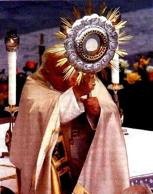 Pope holds pagan sun-god ornament